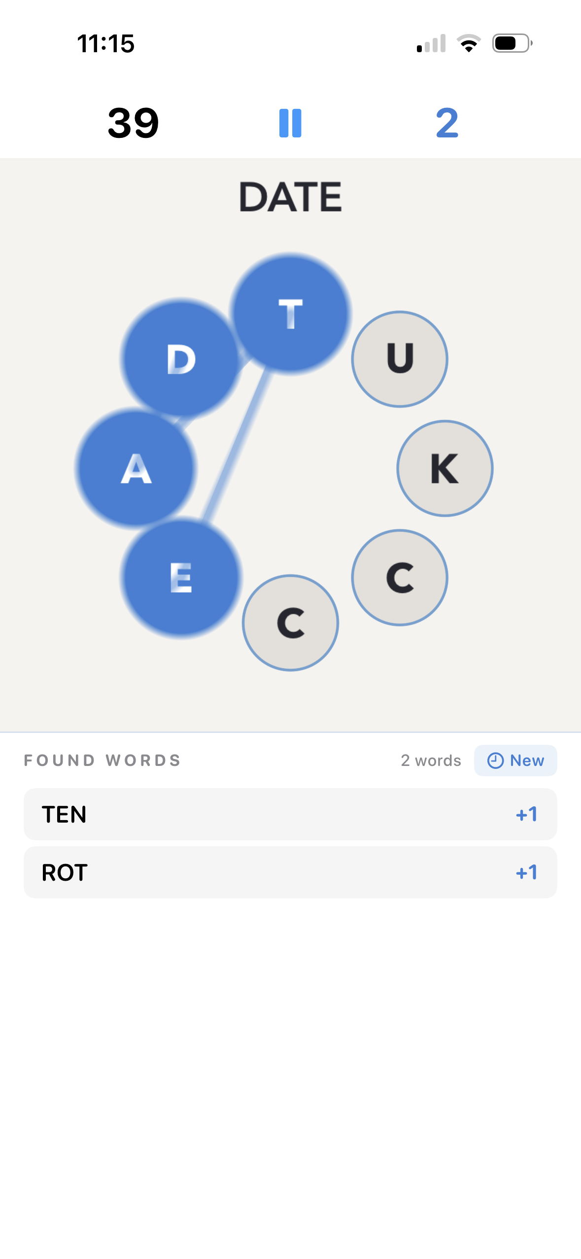 Lettervolt gameplay in light theme, swiping letters D-A-T-E on the circular wheel